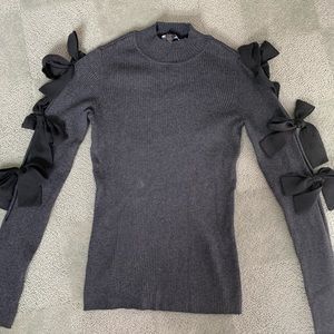 Dark Grey sweater with black bows NWOT never worn!